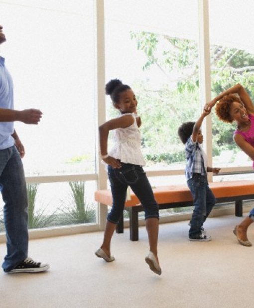 Family dancing together Family dancing together --- Image by © Blue Images/Corbis